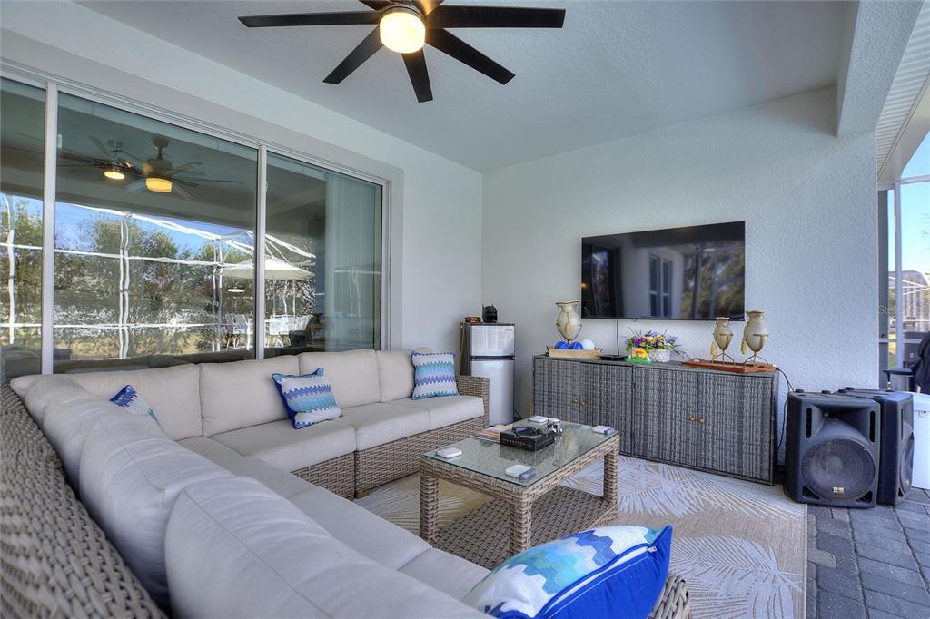8811 Bally Neal Loop Davenport, FL 33896 - Photo 45 of 82 a living room with furniture and a large window