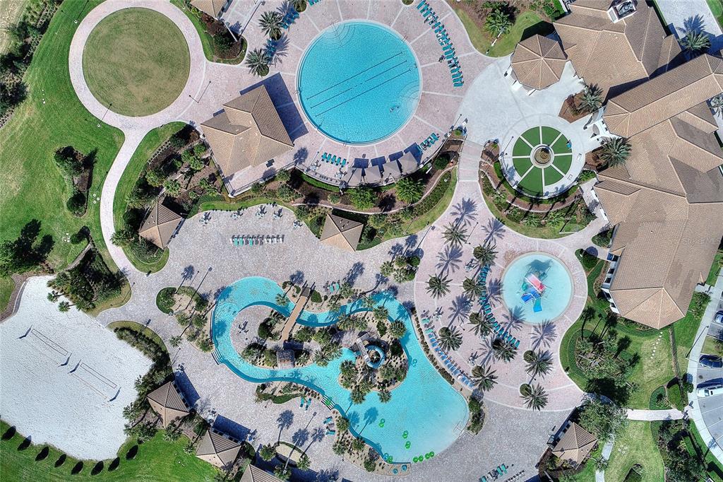 8811 Bally Neal Loop Davenport, FL 33896 - Photo 57 of 82 an aerial view of a swimming pool with outdoor seating and yard