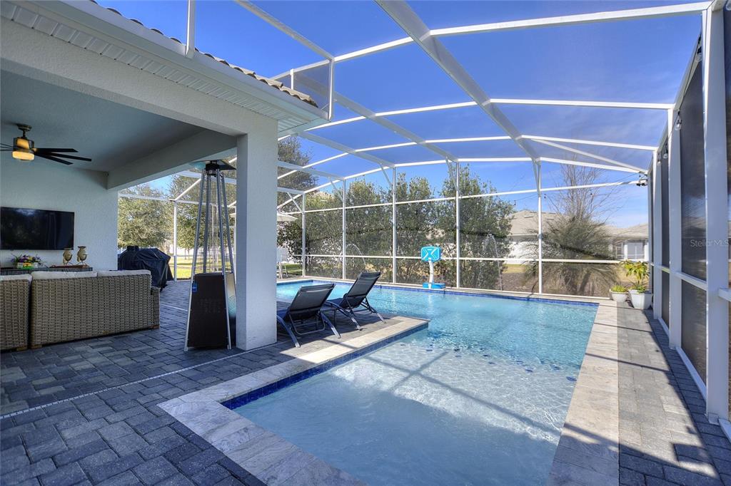 8811 Bally Neal Loop Davenport, FL 33896 - Photo 6 of 82 a living room with furniture and a large window