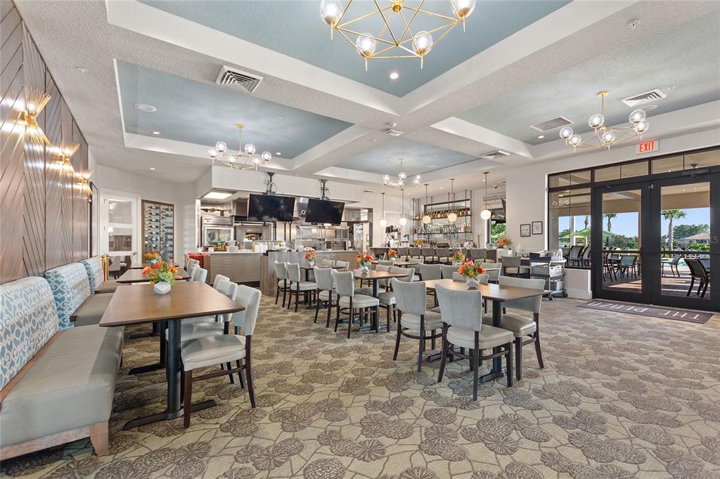 8811 Bally Neal Loop Davenport, FL 33896 - Photo 67 of 82 a view of a dining room with furniture