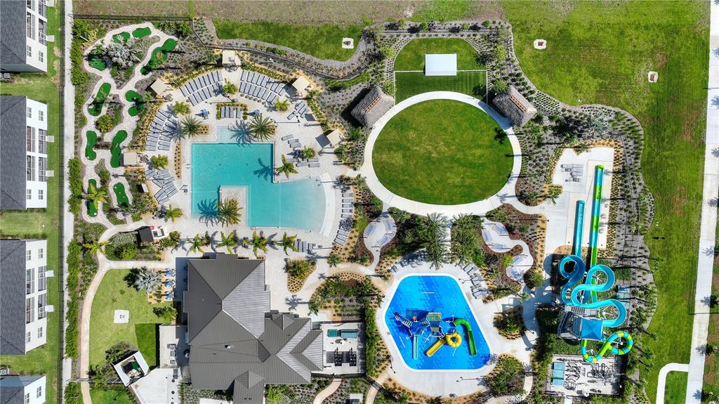 8811 Bally Neal Loop Davenport, FL 33896 - Photo 79 of 82 an aerial view of a house with swimming pool and outdoor space