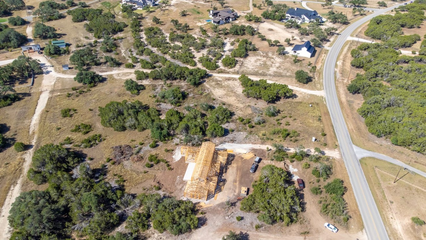 2251 West Fitzhugh Road Dripping Springs, TX 78620 - Photo 14 of 16 a view of a yard with plants