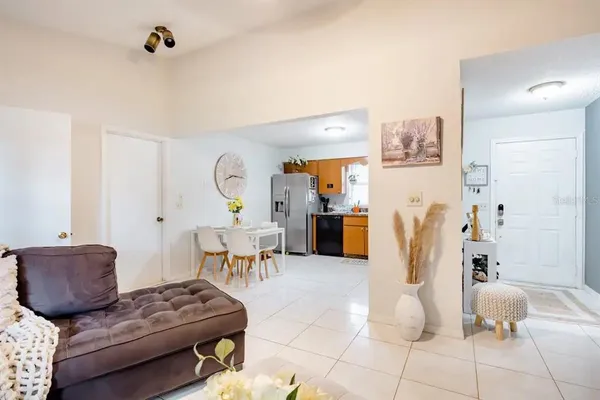 a living room with furniture and a table