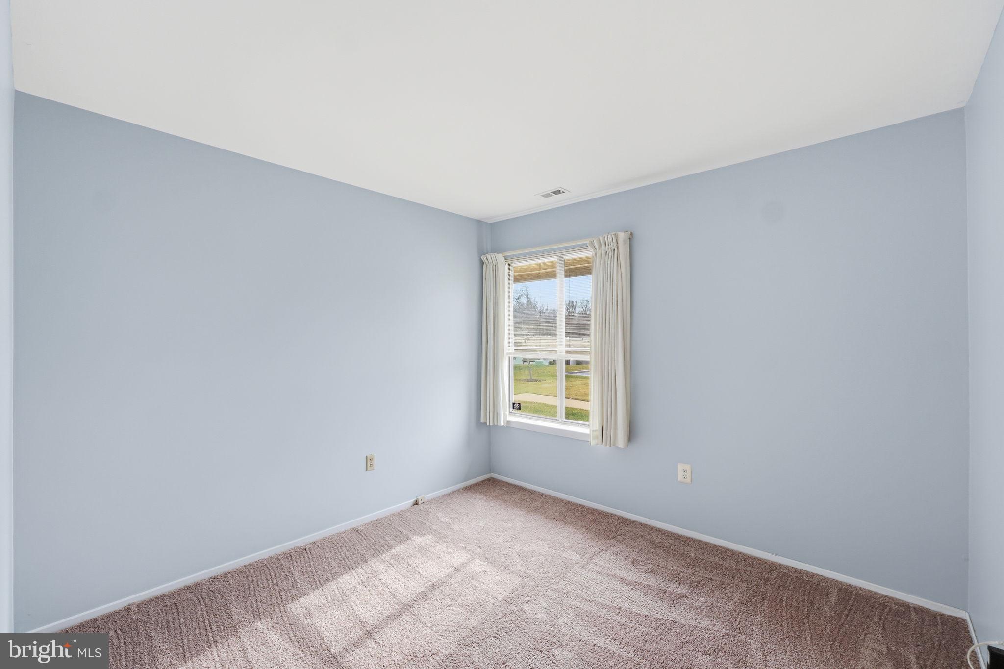 3103 Beckenham Court, Unit 252D Silver Spring, MD 20906 - Photo 16 of 32 an empty room with a window