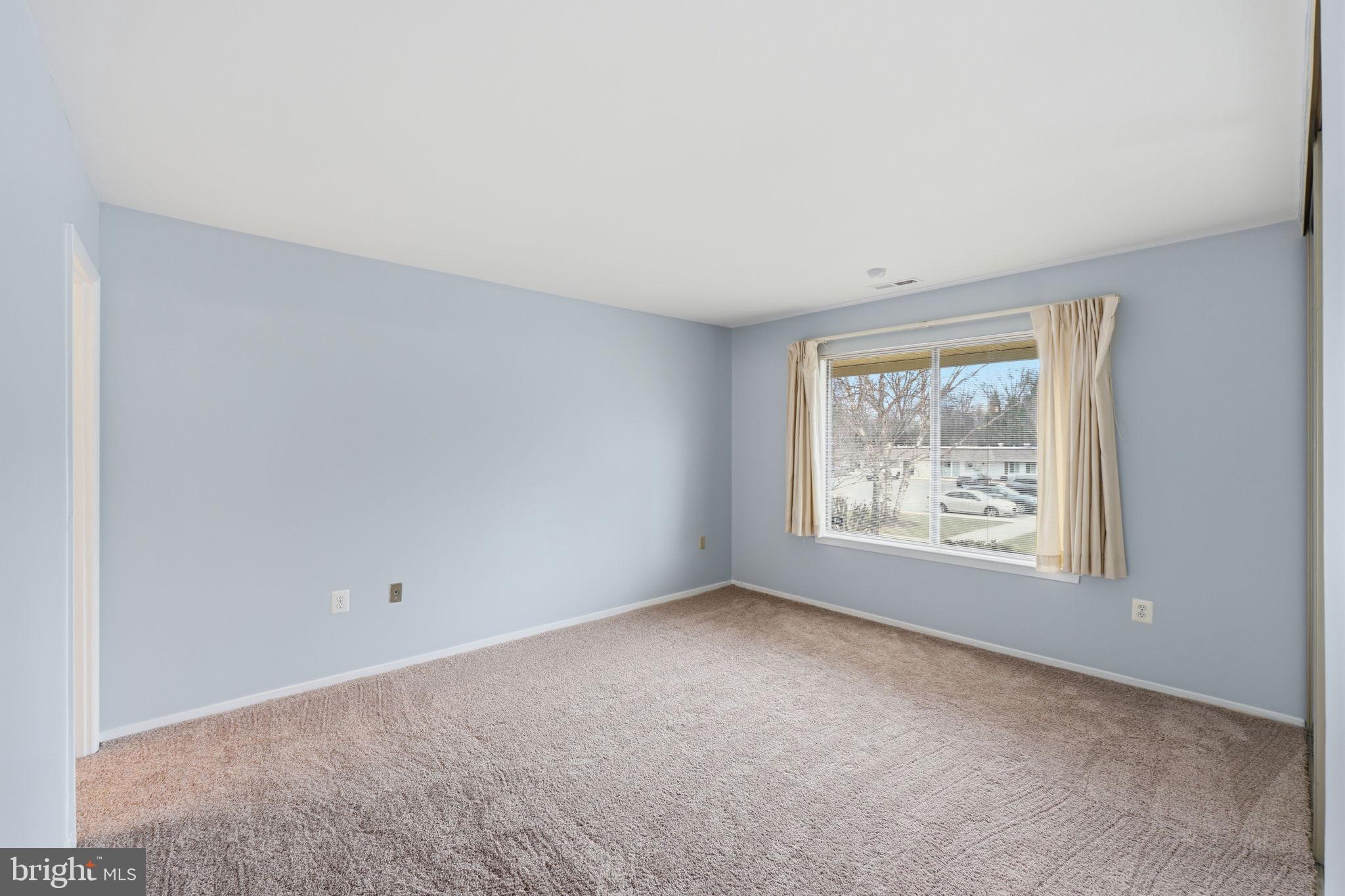 3103 Beckenham Court, Unit 252D Silver Spring, MD 20906 - Photo 23 of 32 an empty room with a window