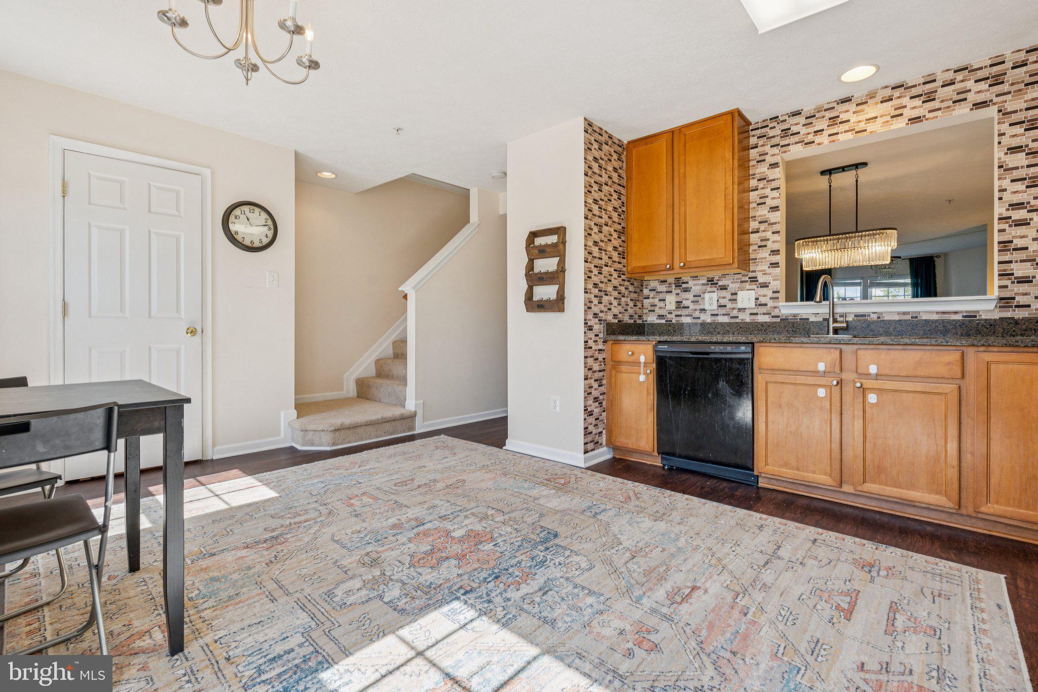 9740 Biggs Road Middle River, MD 21220 - Photo 13 of 37 a view of kitchen with granite countertop cabinets and a fireplace