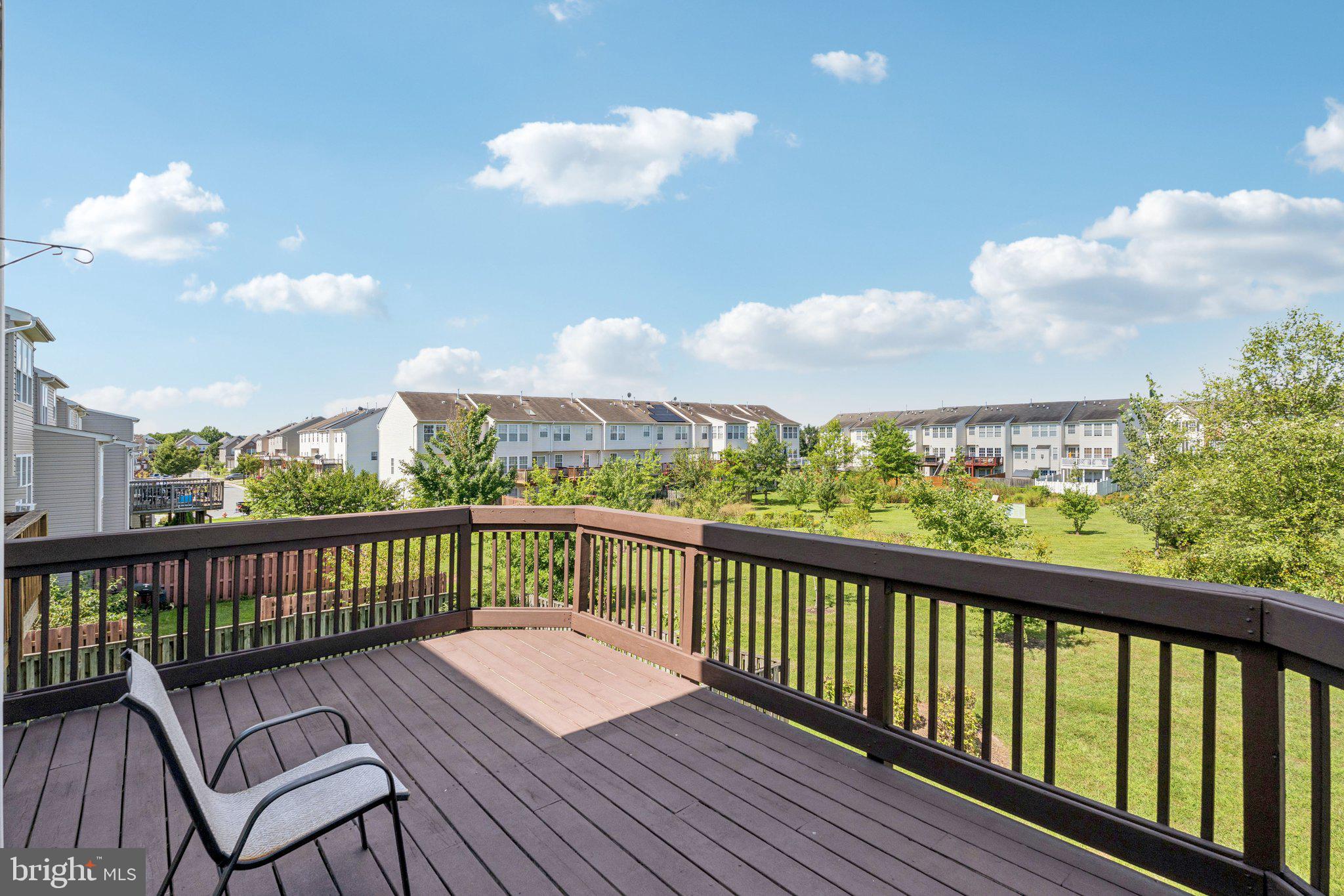 9740 Biggs Road Middle River, MD 21220 - Photo 15 of 37 a view of a balcony with wooden floor