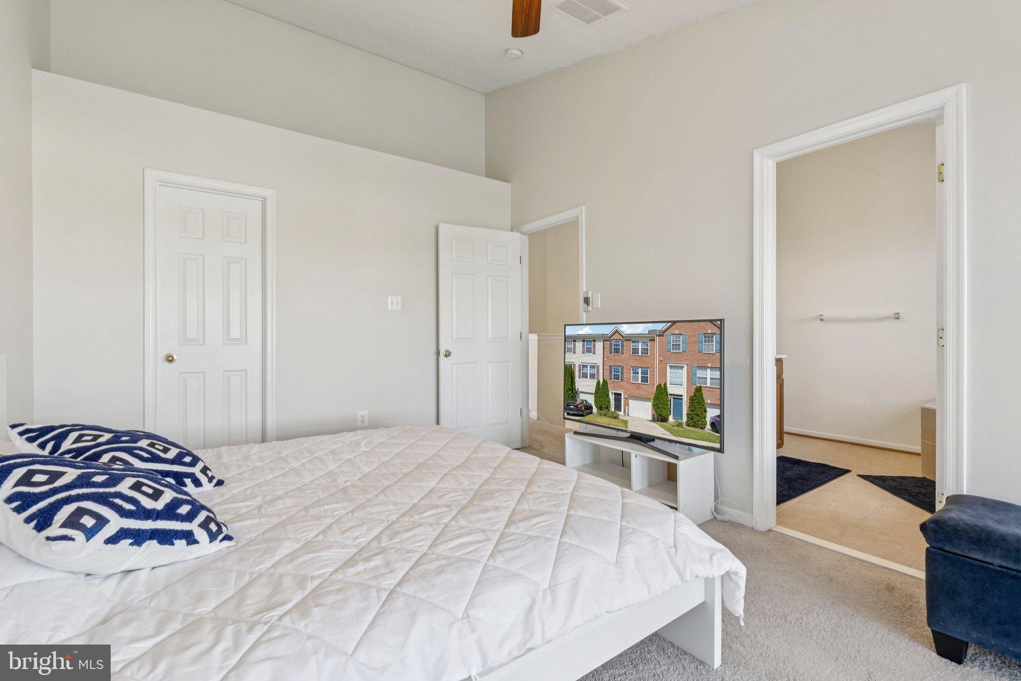 9740 Biggs Road Middle River, MD 21220 - Photo 18 of 37 a bedroom with a bed and a dresser