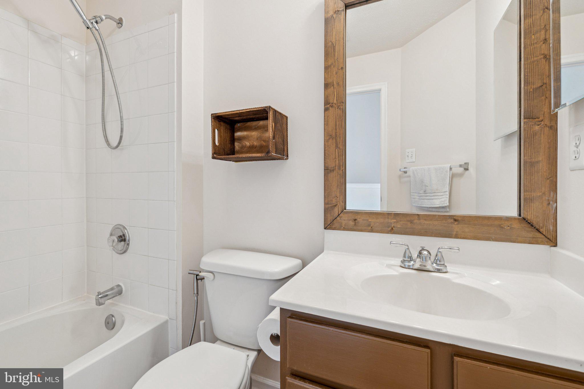 9740 Biggs Road Middle River, MD 21220 - Photo 29 of 37 a bathroom with a sink toilet and shower