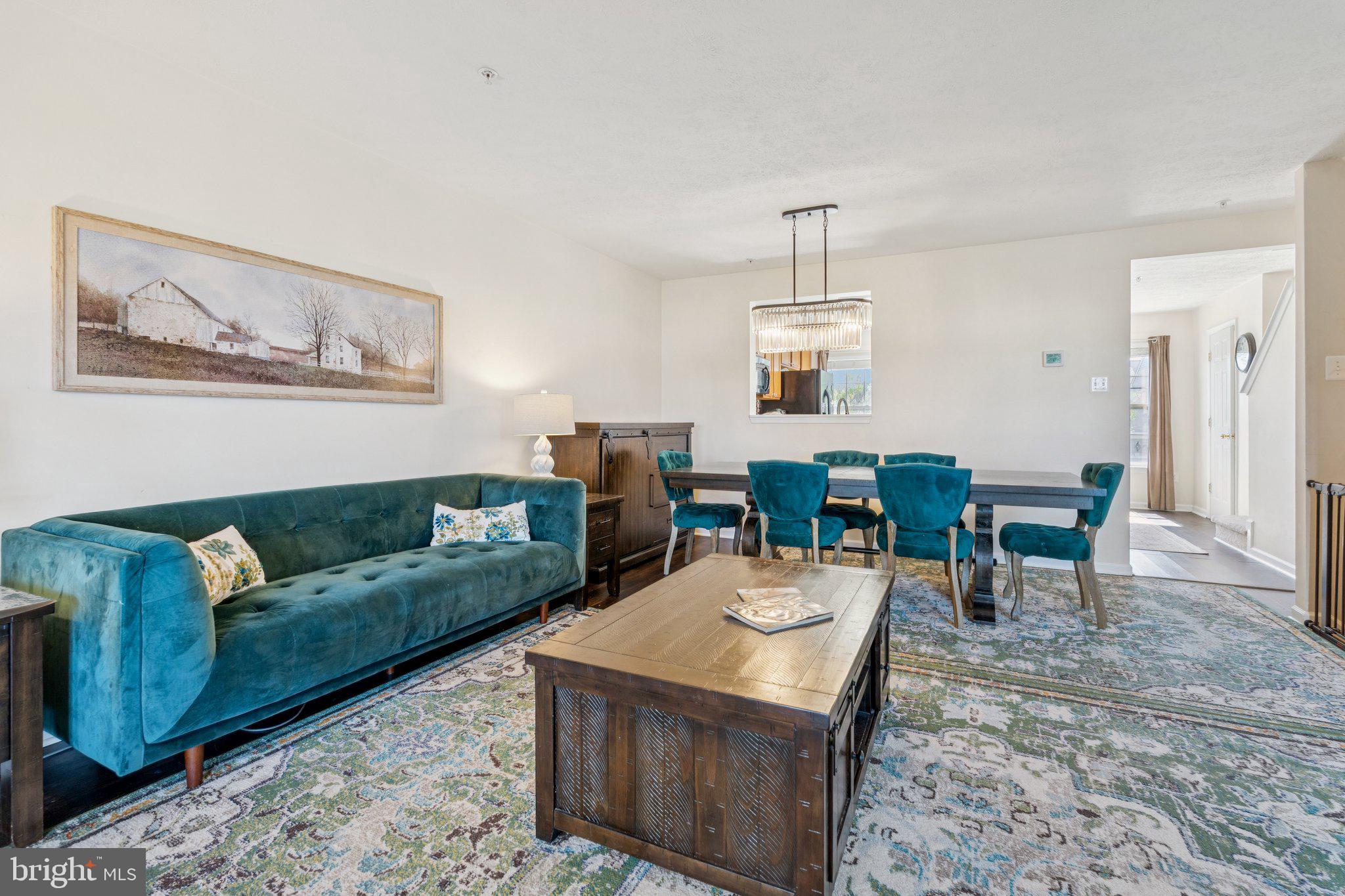 9740 Biggs Road Middle River, MD 21220 - Photo 3 of 37 a living room with furniture and a dining table