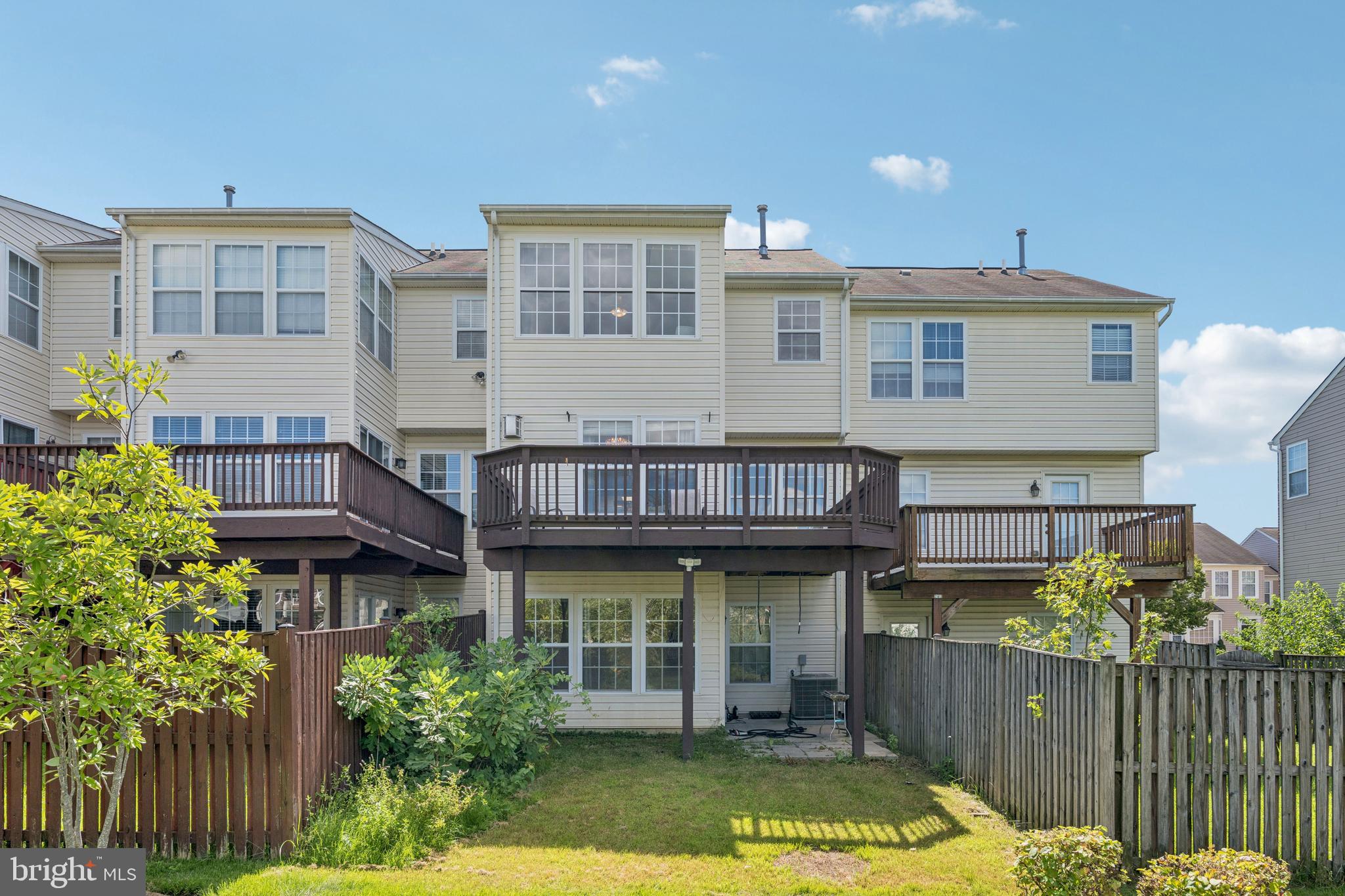 9740 Biggs Road Middle River, MD 21220 - Photo 33 of 37 a view of a house with wooden deck and furniture