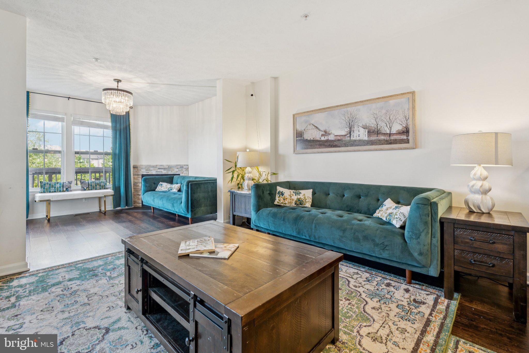 9740 Biggs Road Middle River, MD 21220 - Photo 4 of 37 a living room with furniture and wooden floor