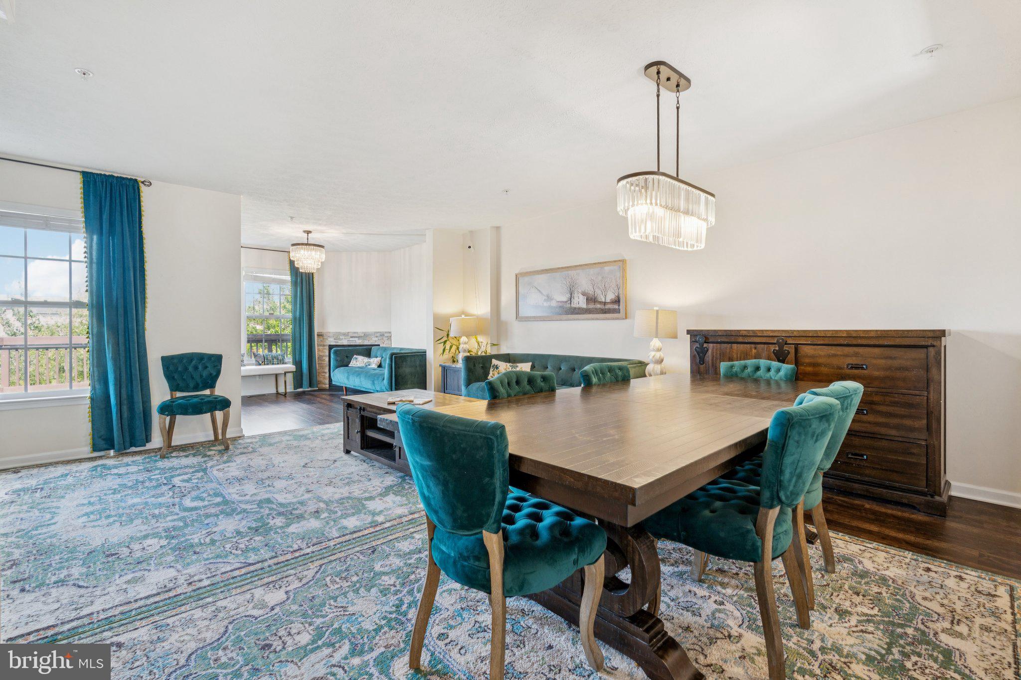 9740 Biggs Road Middle River, MD 21220 - Photo 7 of 37 a view of a dining room with furniture window and wooden floor