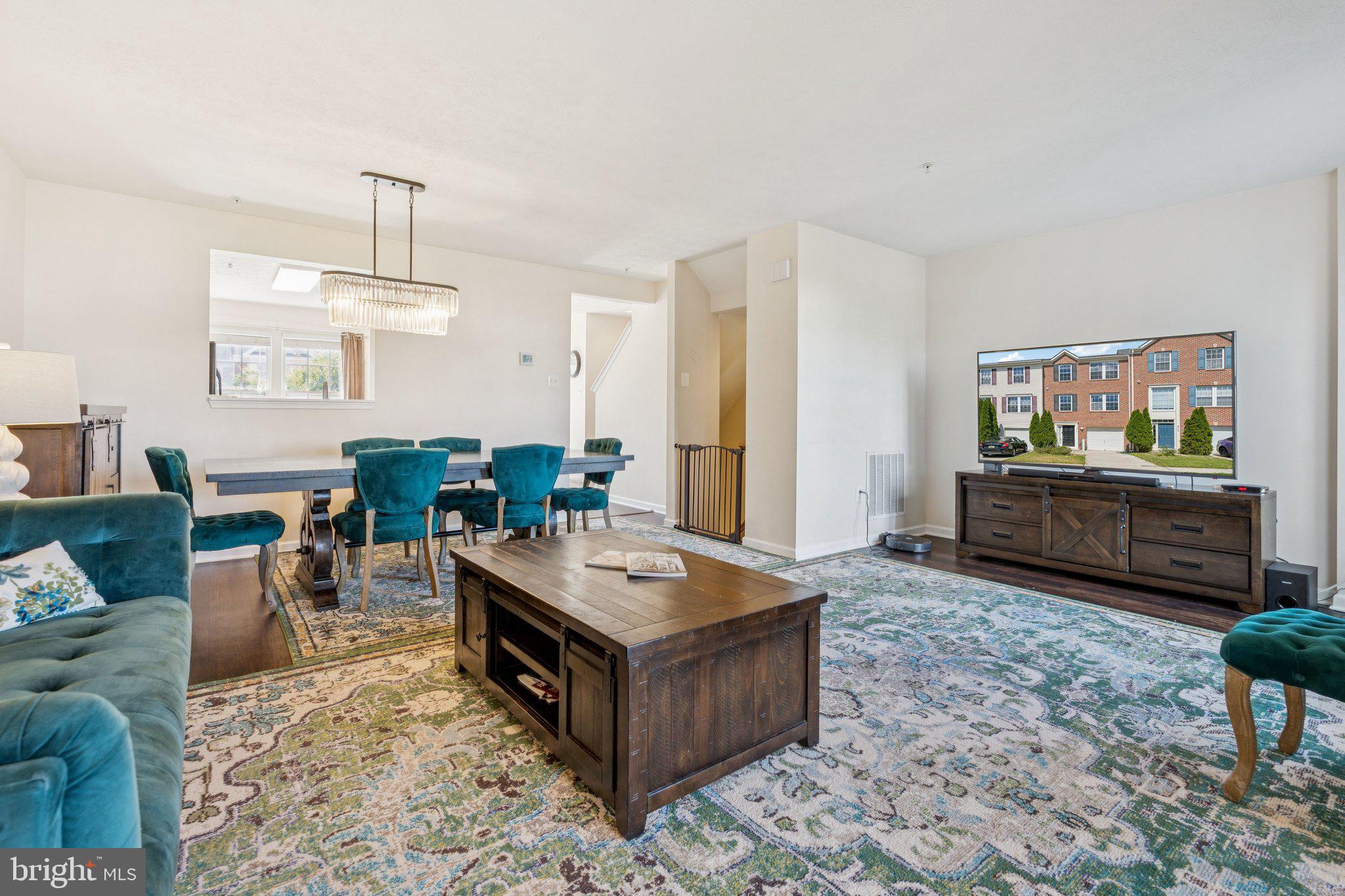 9740 Biggs Road Middle River, MD 21220 - Photo 9 of 37 a living room with furniture and a wooden floor