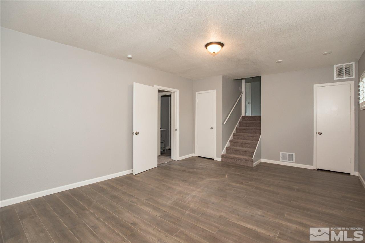 600 Akard Circle Reno, NV 89503 - Photo 18 of 25 a view of an empty room with wooden floor and entryway
