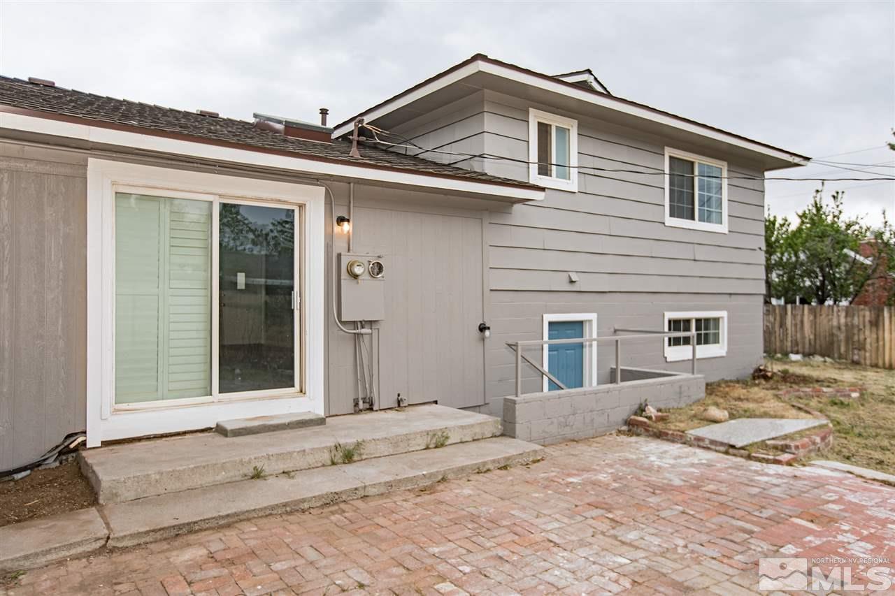 600 Akard Circle Reno, NV 89503 - Photo 19 of 25 a front view of a house with a yard