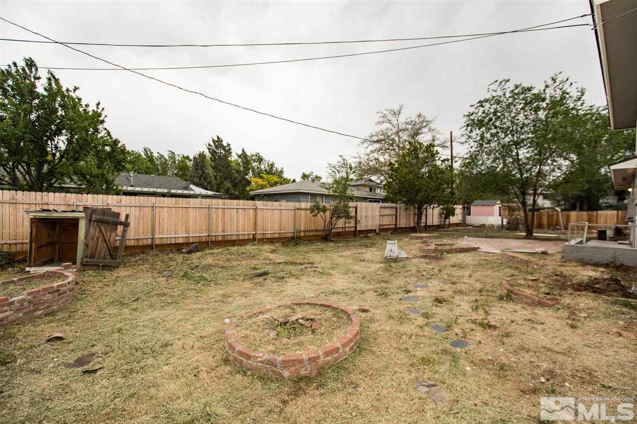 600 Akard Circle Reno, NV 89503 - Photo 21 of 25 a backyard of a house with lots of green space