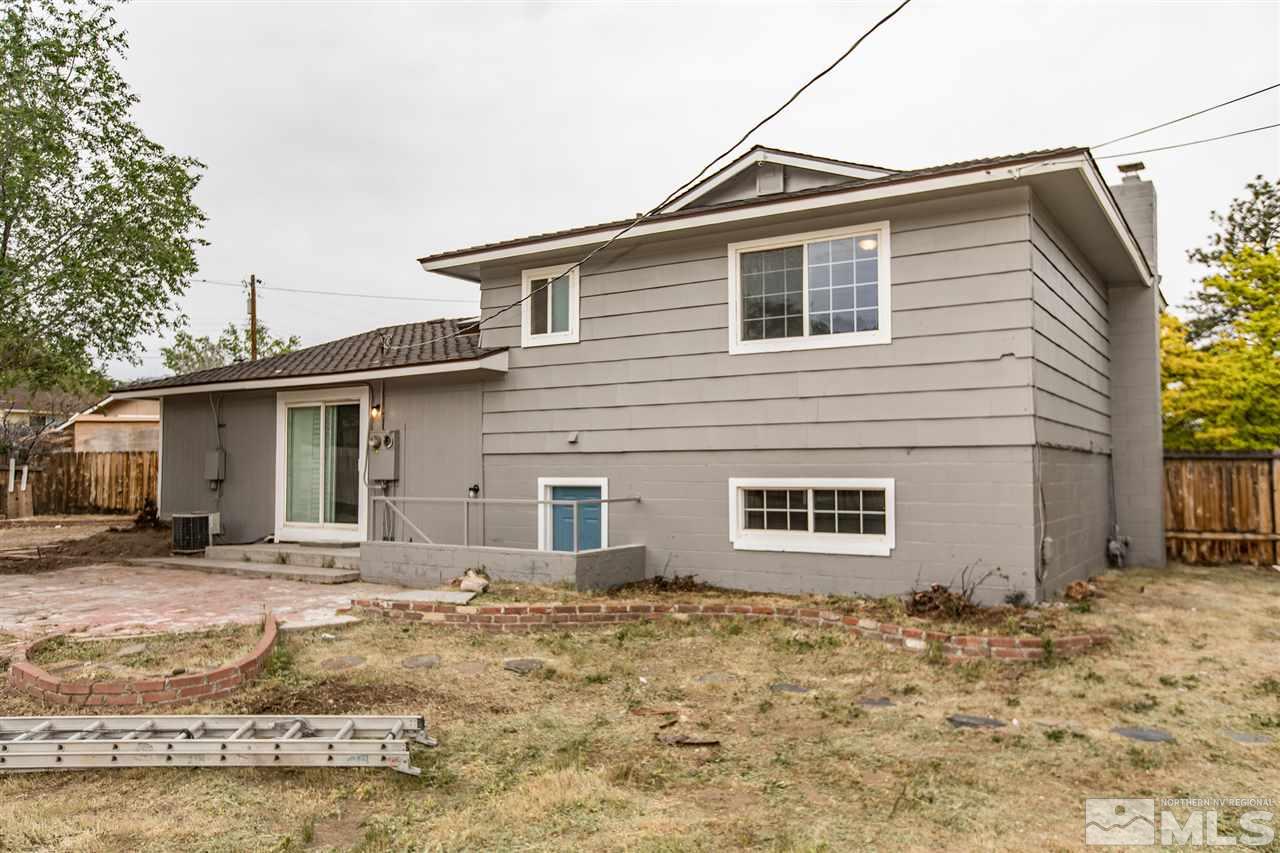 600 Akard Circle Reno, NV 89503 - Photo 23 of 25 a house that has a tree in front of it