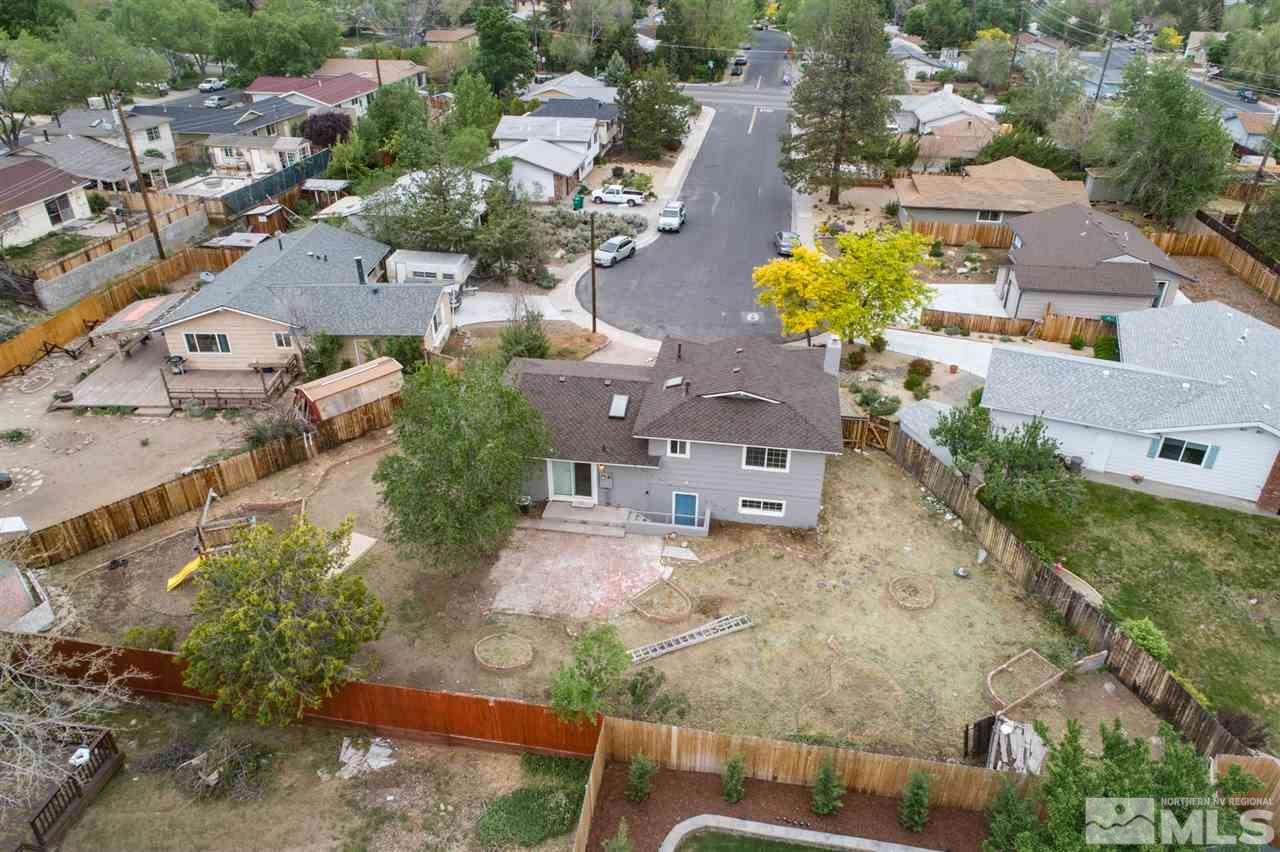 600 Akard Circle Reno, NV 89503 - Photo 25 of 25 an aerial view of a house with a yard and lake view