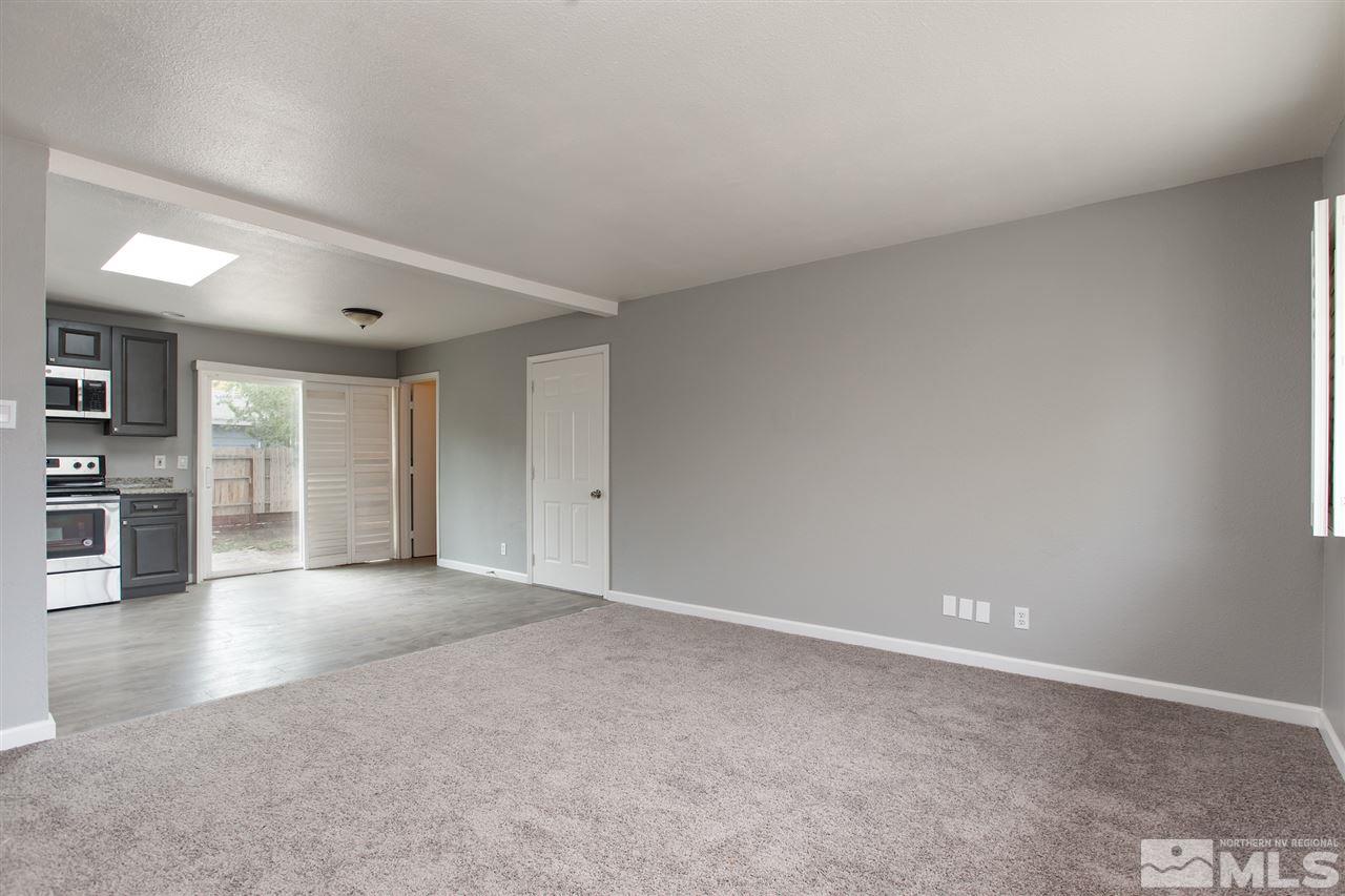 600 Akard Circle Reno, NV 89503 - Photo 8 of 25 a view of an empty room with window and cabinet