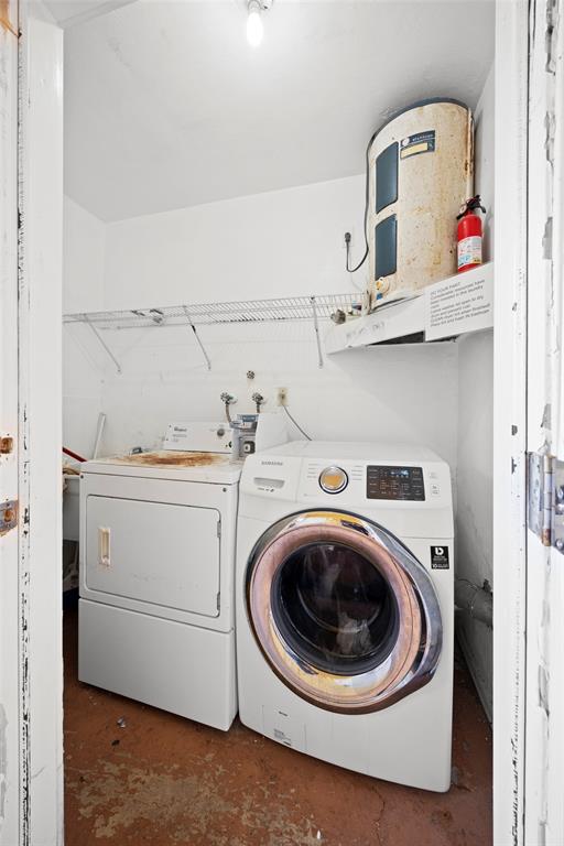 2131 North Ocean Boulevard, Unit 17 Fort Lauderdale, FL 33305 - Photo 18 of 27 a utility room with sink dryer and washer
