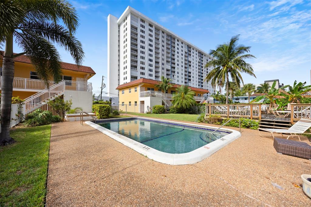 2131 North Ocean Boulevard, Unit 17 Fort Lauderdale, FL 33305 - Photo 22 of 27 a view of outdoor space yard swimming pool and patio