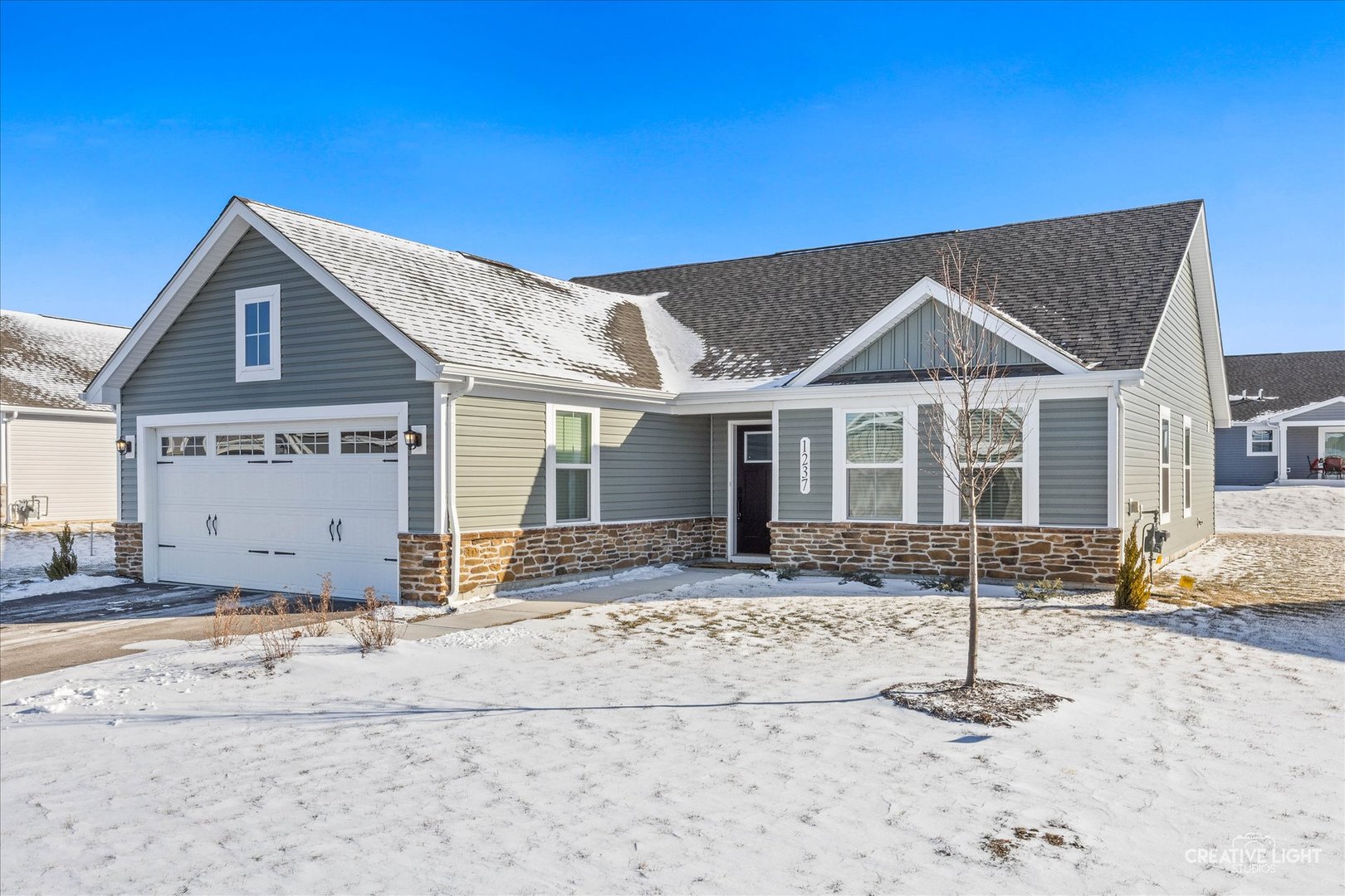 a front view of a house with a terrace