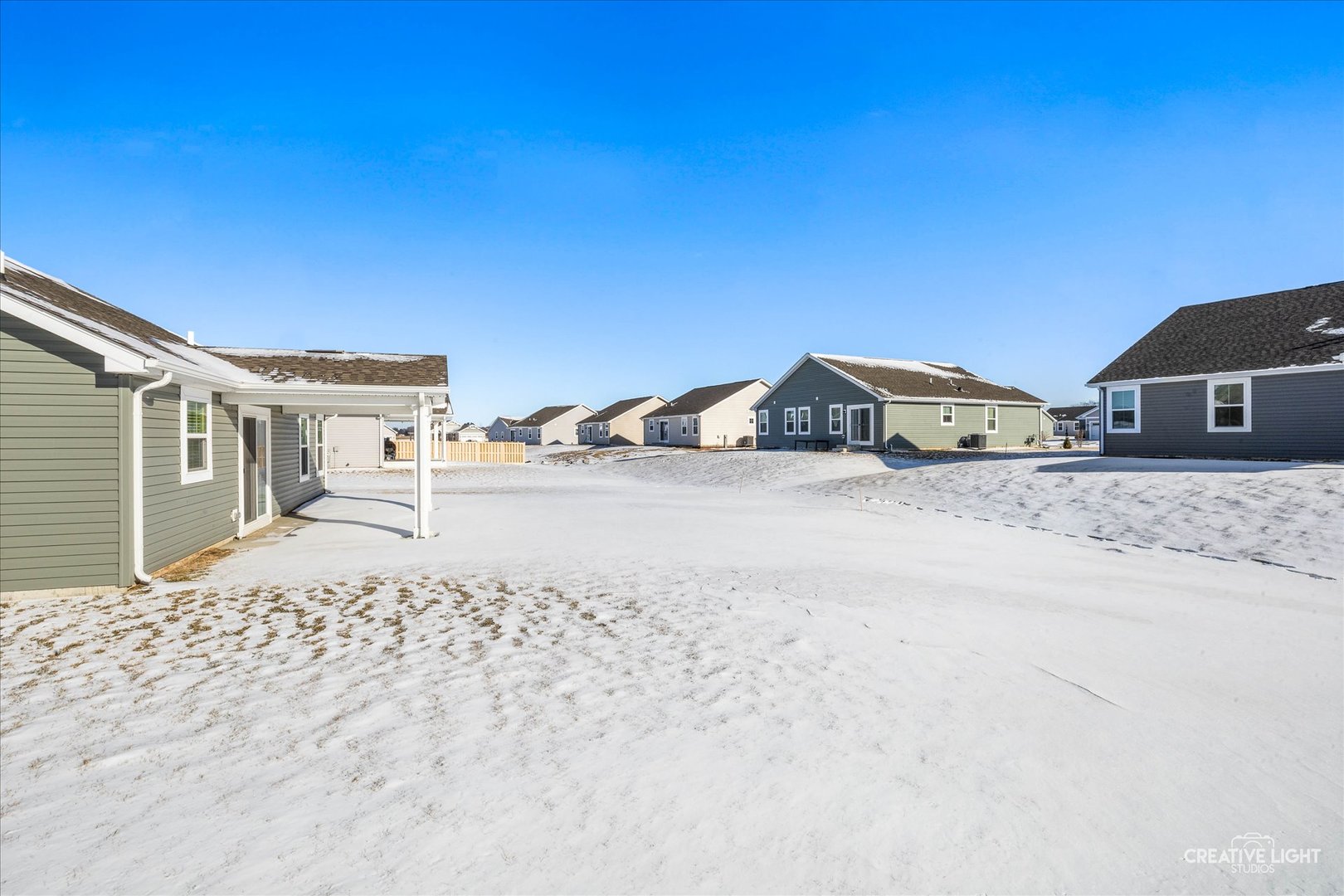 1237 Marigold Lane Hampshire, IL 60140 - Photo 26 of 27 a view of a car park in front of a house