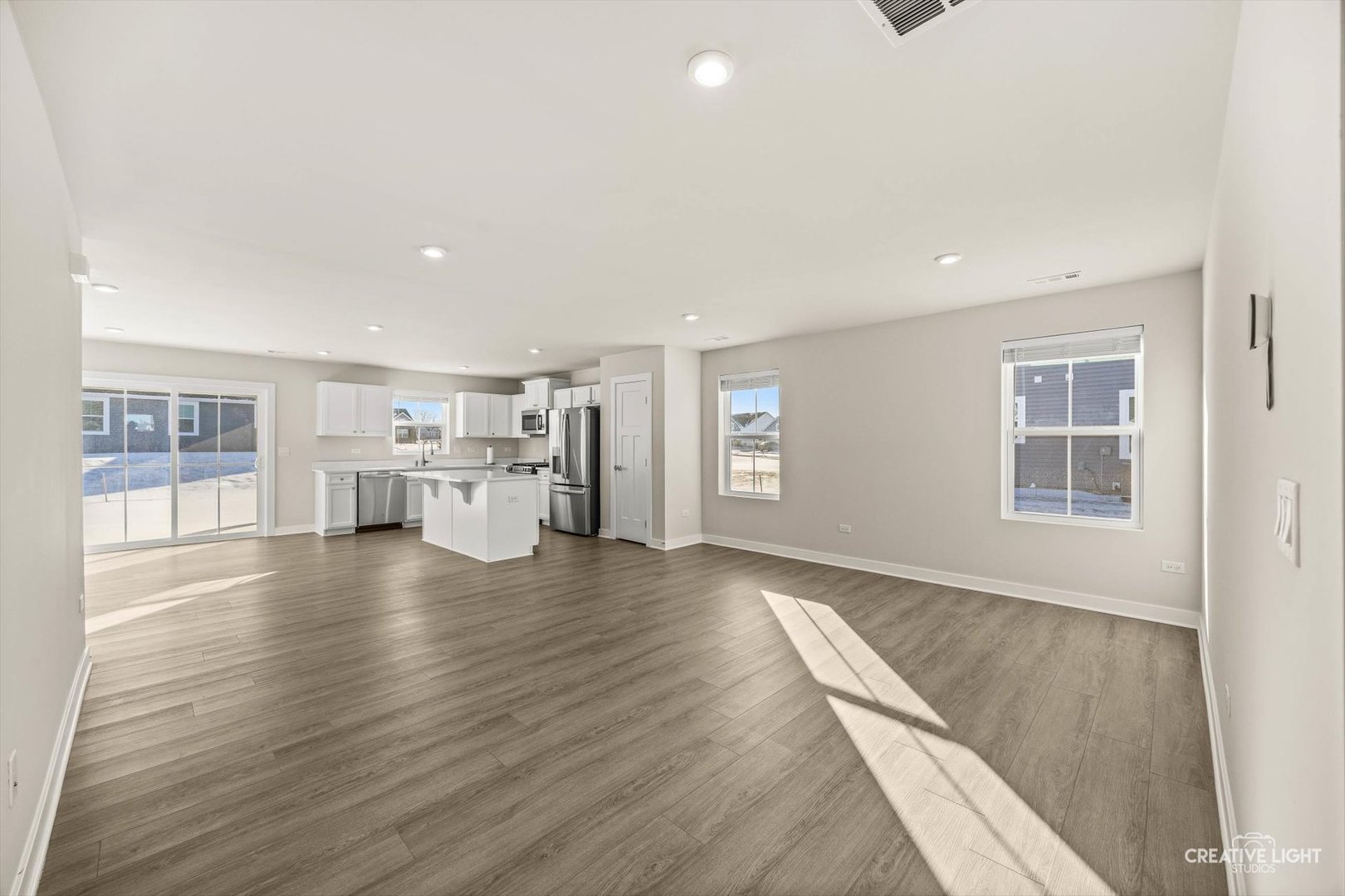 1237 Marigold Lane Hampshire, IL 60140 - Photo 7 of 27 a view of empty room with wooden floor