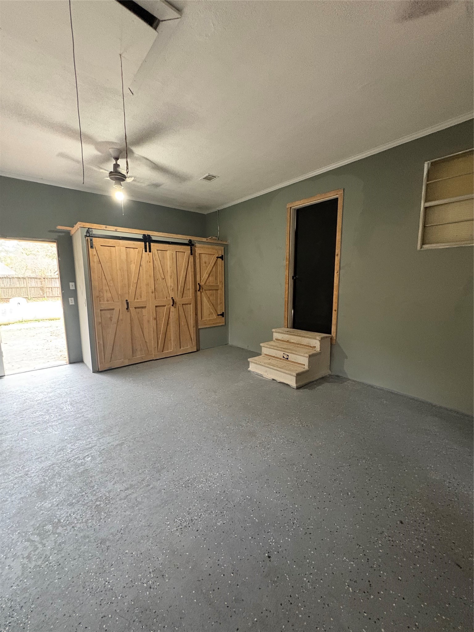 1301 Magnolia Point Drive Huffman, TX 77336 - Photo 8 of 12 a view of a room with cabinet wooden floor and windows