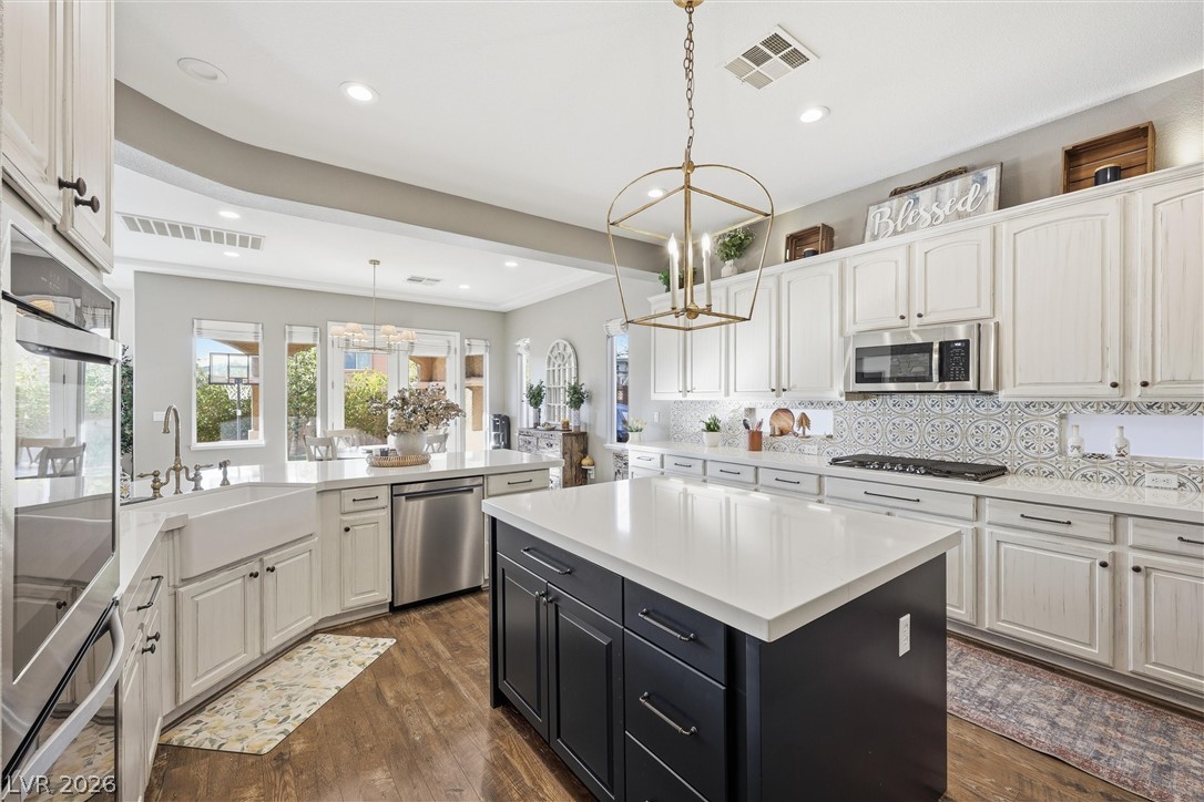 2737 Tarbert Street Henderson, NV 89044 - Photo 19 of 60 This spacious kitchen offers ample counter space, making it perfect for cooking and entertaining.