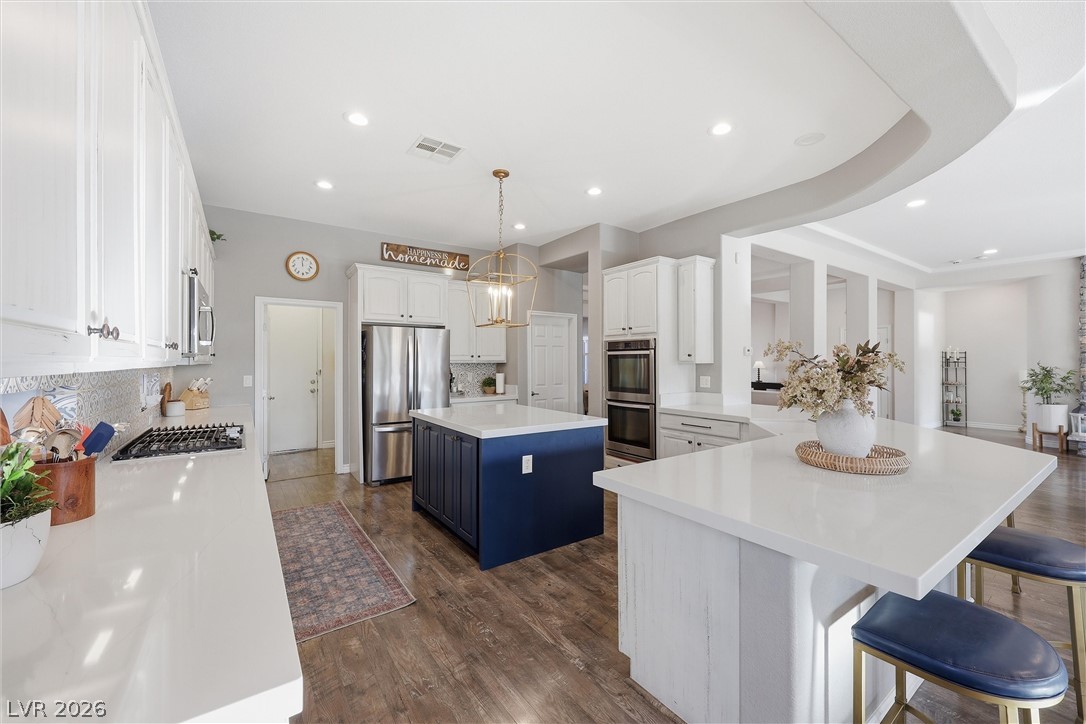 2737 Tarbert Street Henderson, NV 89044 - Photo 21 of 60 This kitchen showcases a modern design with sleek surfaces and functional living.