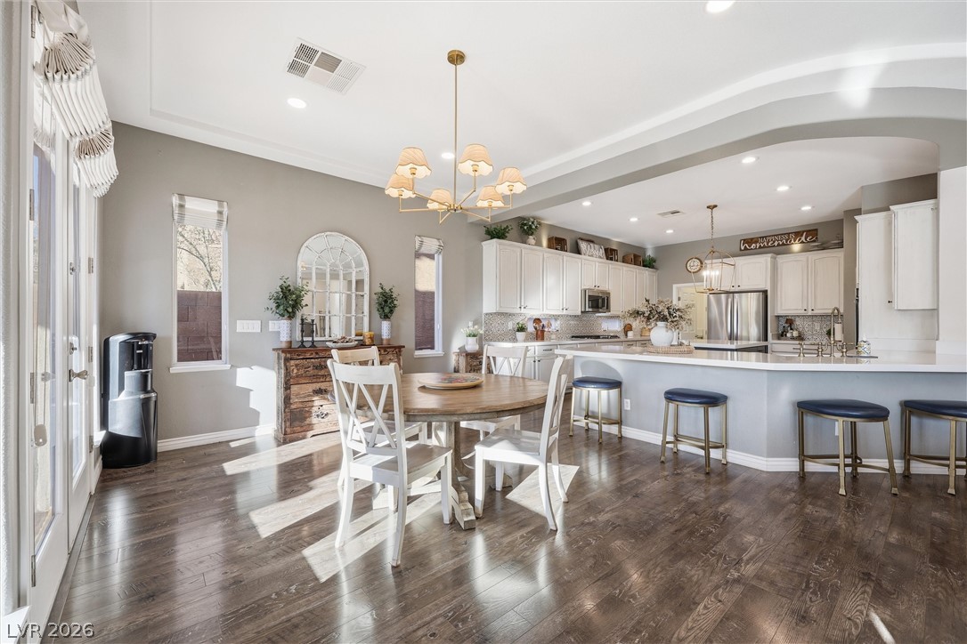 2737 Tarbert Street Henderson, NV 89044 - Photo 23 of 60 Bright and open, this kitchen and dining area offers ample space for entertaining.
