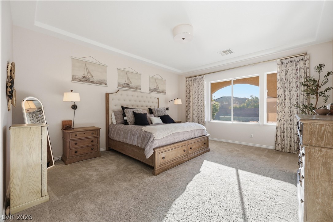 2737 Tarbert Street Henderson, NV 89044 - Photo 30 of 60 This expansive bedroom offers abundant natural light and plush carpeting for ultimate comfort.