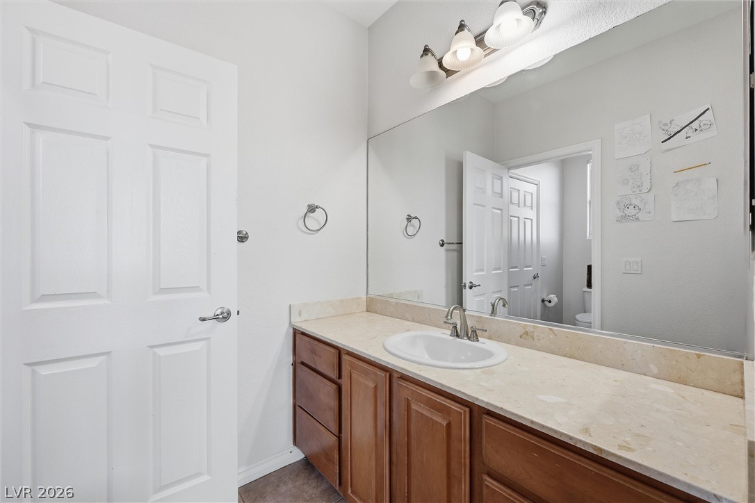 2737 Tarbert Street Henderson, NV 89044 - Photo 35 of 60 This bathroom features a sleek vanity, complete with a contemporary sink and ample counter space.