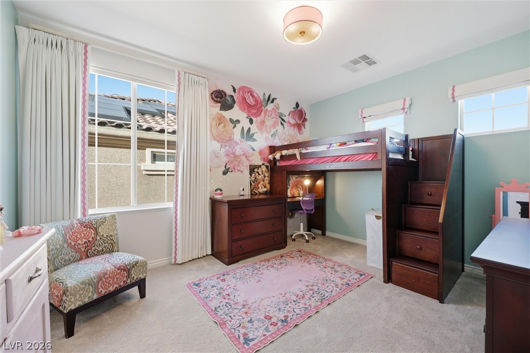 2737 Tarbert Street Henderson, NV 89044 - Photo 37 of 60 This cozy bedroom offers bright windows and soft carpeting, creating a tranquil retreat for rest and study.