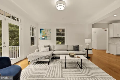 a view of livingroom with furniture and a window