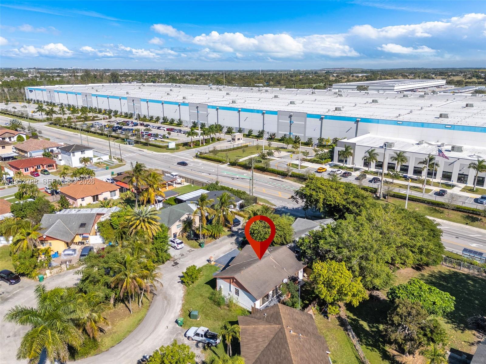 13202 Southwest 276th Terrace Homestead, FL 33032 - Photo 16 of 19 a view of a city with an ocean view