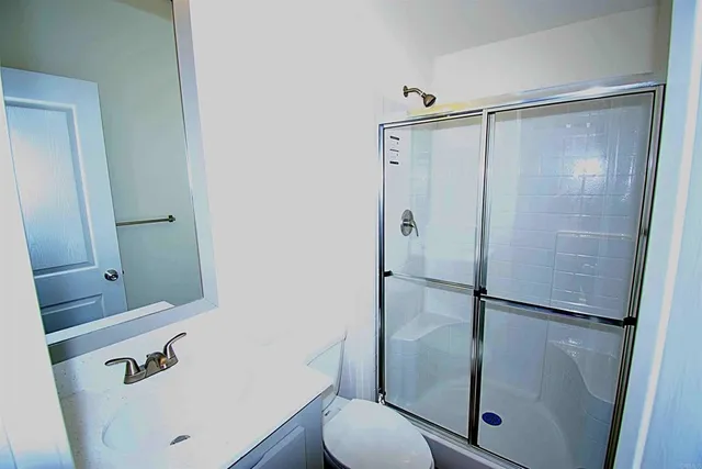 a view of a room with a hallway