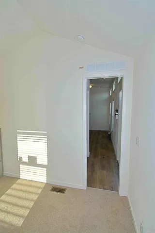 a bathroom with a shower and a toilet