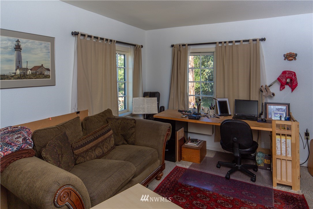 717 Franklin Street Port Townsend, WA 98368 - Photo 14 of 25 a living room with furniture and a window
