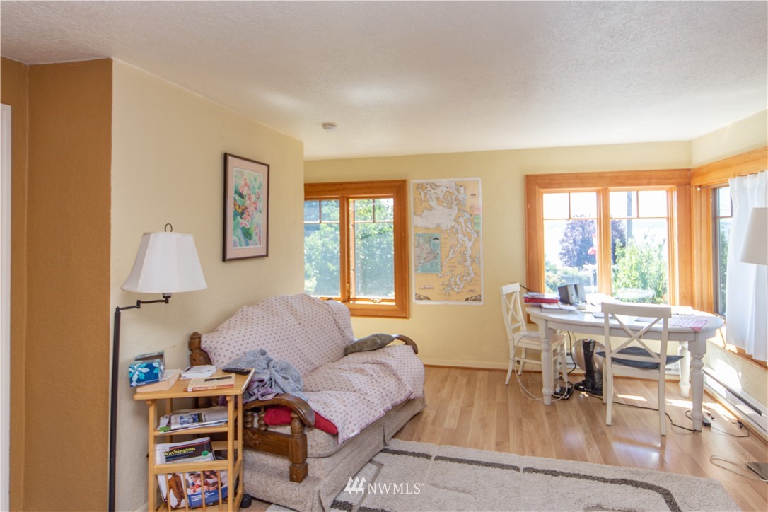 717 Franklin Street Port Townsend, WA 98368 - Photo 17 of 25 a living room with furniture and a large window