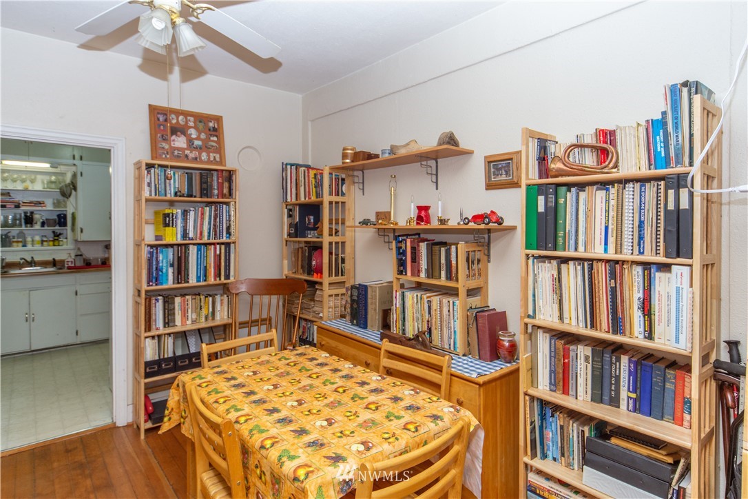 717 Franklin Street Port Townsend, WA 98368 - Photo 5 of 25 a living room with lots of books