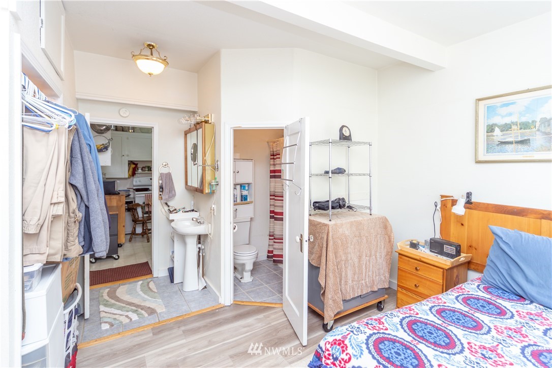 717 Franklin Street Port Townsend, WA 98368 - Photo 9 of 25 a living room with furniture and a rug