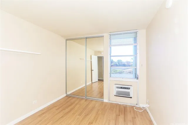 a view of a livingroom with wooden floor