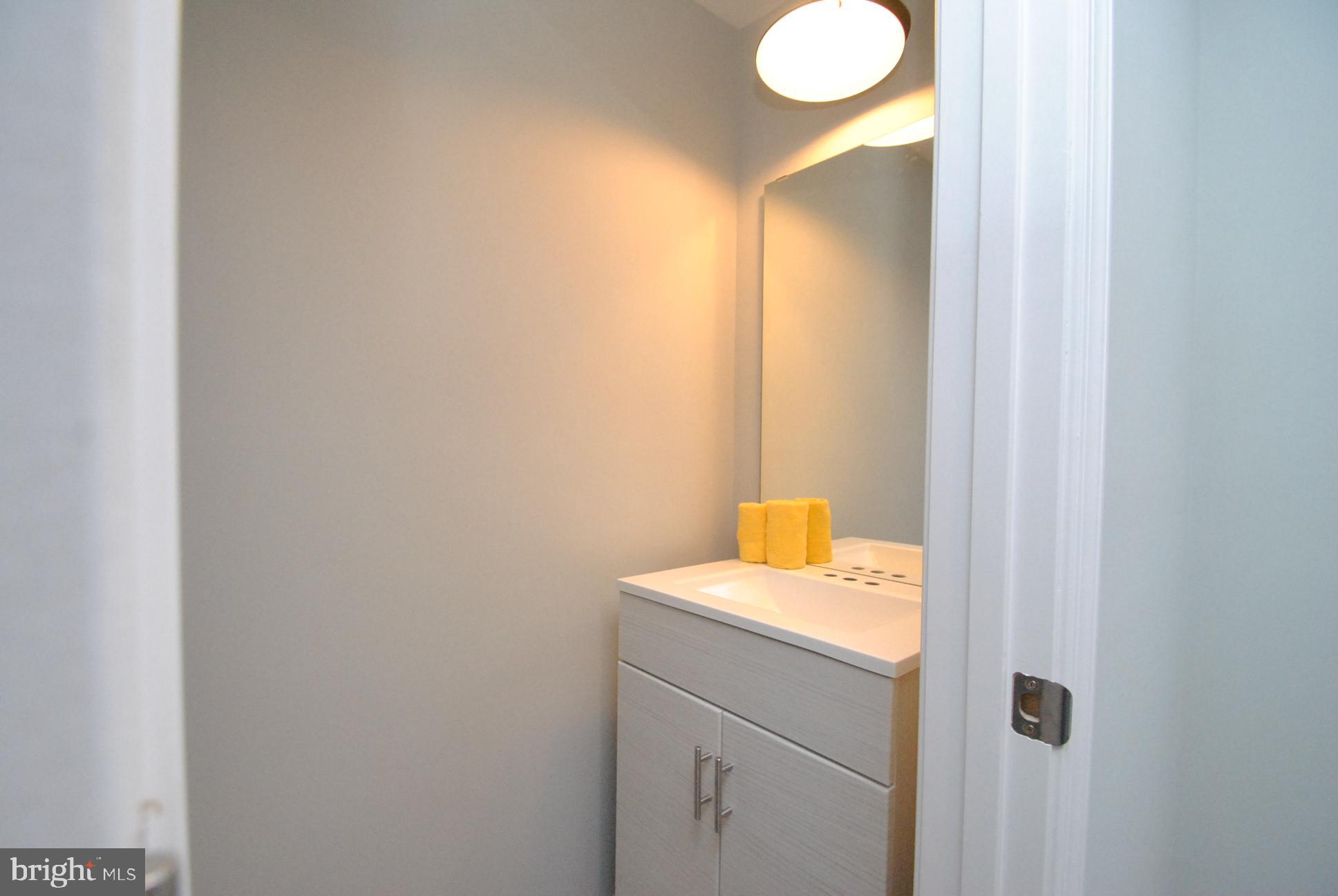 25 Open Gate Court Baltimore, MD 21236 - Photo 11 of 29 HALF BATH ON MAIN LEVEL