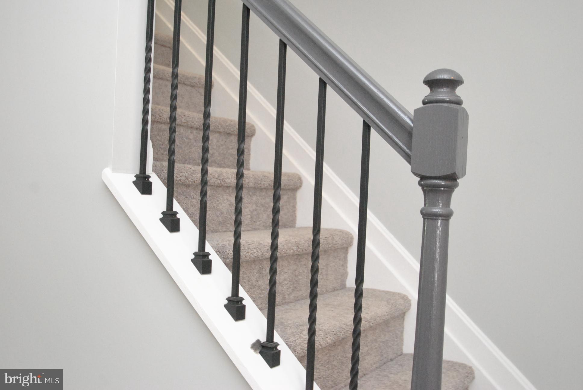 25 Open Gate Court Baltimore, MD 21236 - Photo 12 of 29 STAIRCASE TO UPPER LEVEL