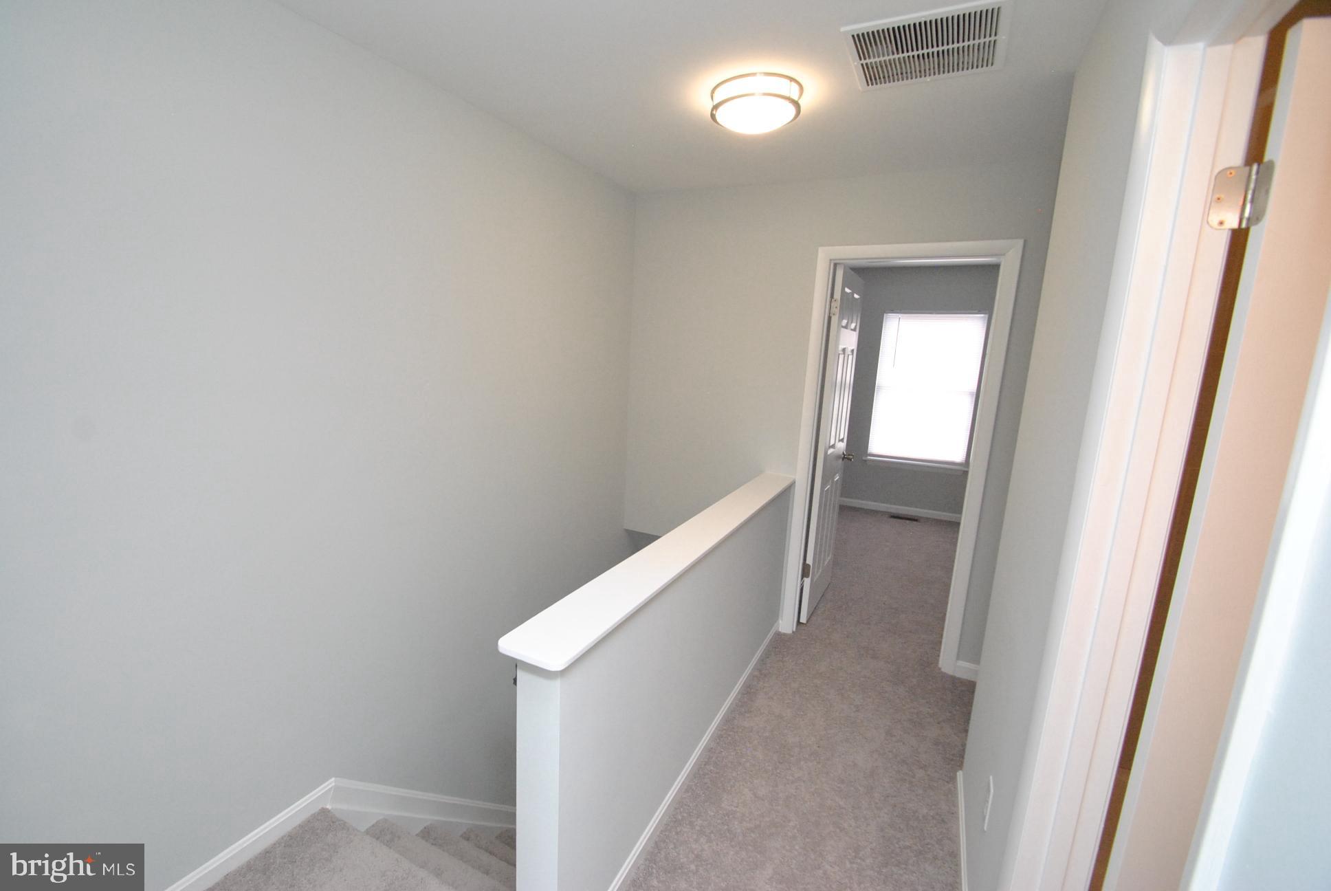 25 Open Gate Court Baltimore, MD 21236 - Photo 22 of 29 UPPER LEVEL HALLWAY