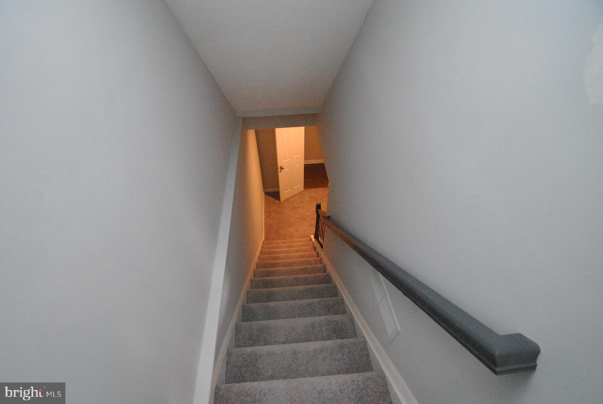 25 Open Gate Court Baltimore, MD 21236 - Photo 23 of 29 STAIRCASE VIEW TO LOWER LEVEL