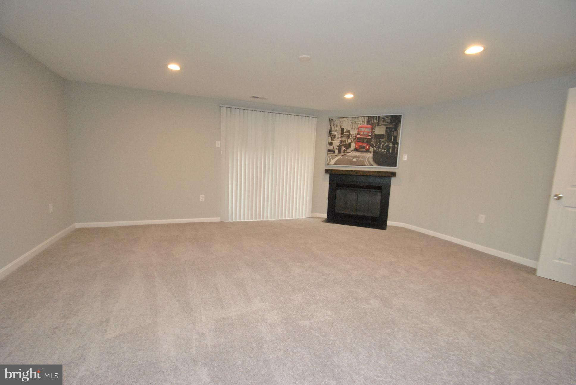 25 Open Gate Court Baltimore, MD 21236 - Photo 26 of 29 FULLY FINISHED LOWER LEVEL WITH FIREPLACE